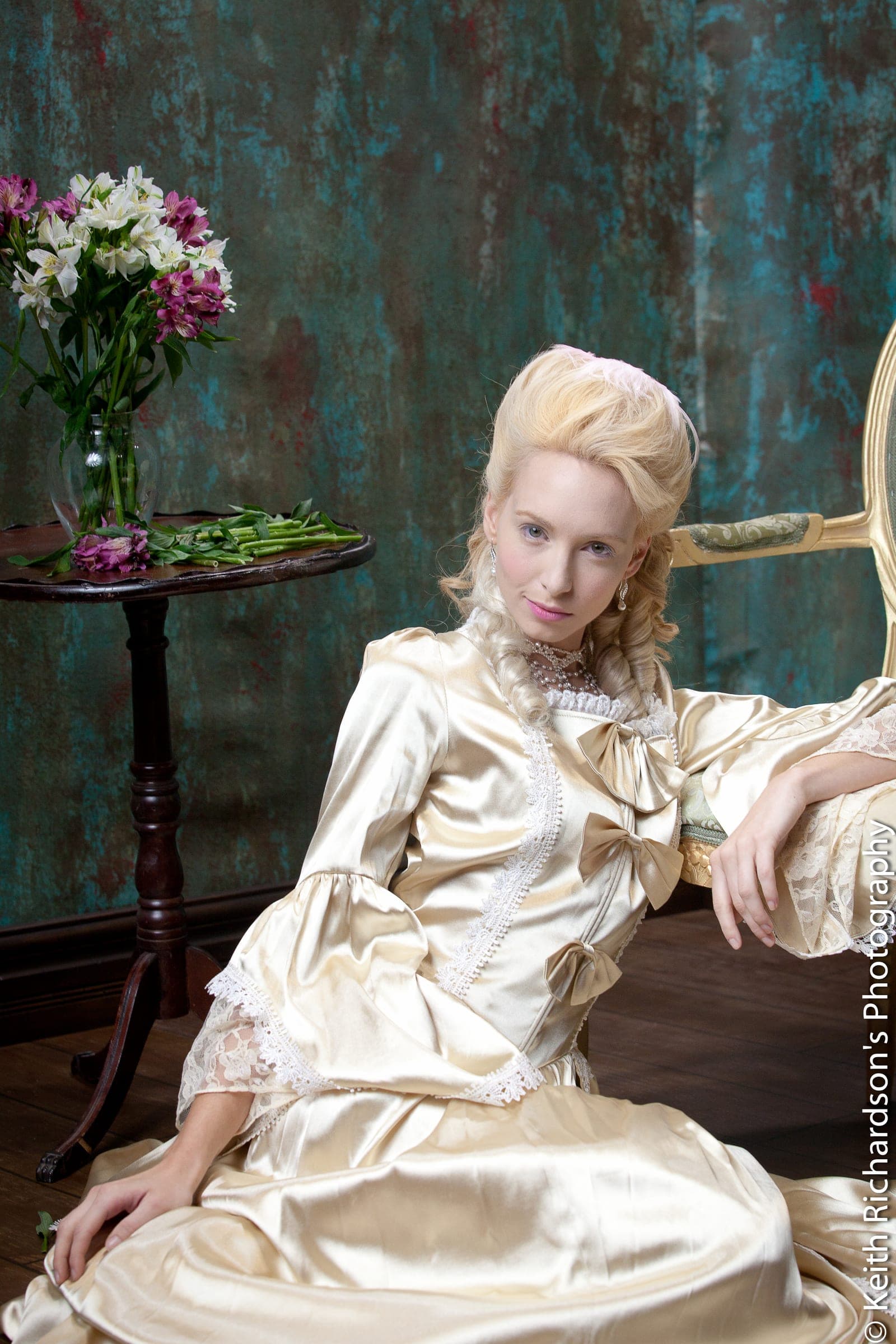 Period-inspired gold gown editorial close portrait
